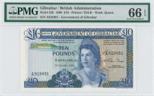 GIBRALTAR: 10 Pounds (21.10.1986) in deep violet, dark brown and deep blue-green on multicolor unpt. Queen Elizabeth II at right on face. S/N: "A 9194...