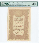 TURKEY: 10 Kurush (AH1295 / 1877) in lilac on light green unpt. Toughra of Abdul Hamid II on face. S/N: "64 61100". Round and box handstamps of Banque...