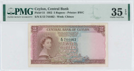 CEYLON: 5 Rupees (3.6.1952) in purple on blue, green and orange unpt. Portrait of Queen Elizabeth II at left on face. S/N: "E/13 744462". WMK: Chinze....