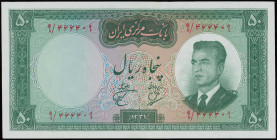 IRAN: 50 Rials (1962) in green on orange and blue unrpt. Type VI portrait of Shah Pahlavi in air force uniform at right on face. Signature 8. S/N: "9/...