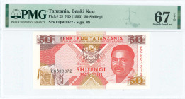 TANZANIA: 50 Shilingi (ND 1993) in red-orange and brown on multicolor unpt. Arms at top center and President Ali Hassan Mwinyi at right on face. S/N: ...