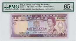 FIJI: 10 Dollars (ND 1986) in purple on multicolor unpt. Queen Elizabeth II at right center, arms at center and artifact at right on face. S/N: "B/8 5...