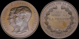 FRANCE: Bronze award medal for the competition of experiences on steam locomotion (1867). Conjoined heads of Marc Seguin and Georges Stephenson facing...