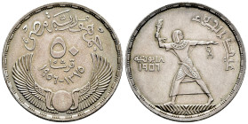 Egypt. 50 piastre. 1375 H (1956). (Km-386). Ag. 28,01 g. Toned. Almost XF. Est...50,00. 

Spanish Description: Egipto. 50 piastre. 1375 H (1956). (K...