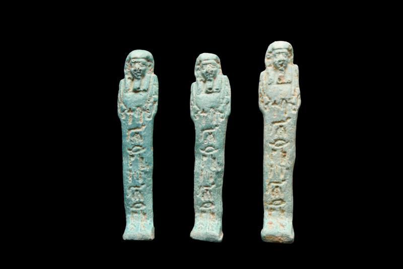 ANCIENT EGYPTIAN GROUP OF THREE FAIENCE USHABTIS
Late Period, 30th Dynasty, Ca....