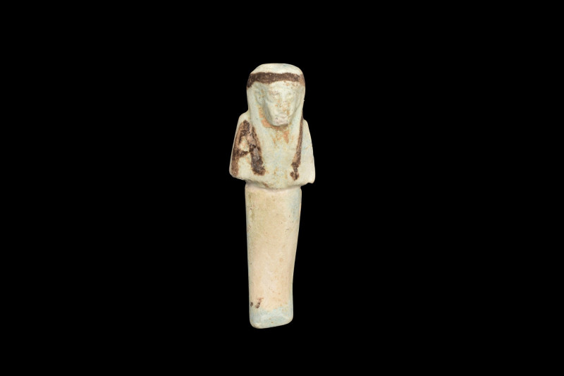 ANCIENT EGYPTIAN FAIENCE USHABTI
Ptolemaic Period, Ca. 332 BC. 
An ancient Egy...