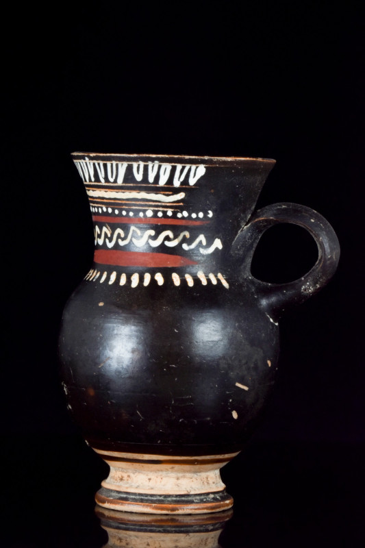 GREEK GNATHIAN TERRACOTTA THISTLE MUG WITH DECORATION
Ca. 350–300 BC. 
A glaze...