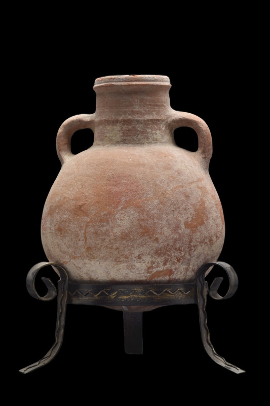 CYPRIOT TERRACOTTA AMPHORA
Ca. 2nd millennium BC. 
A finely modelled red terra...