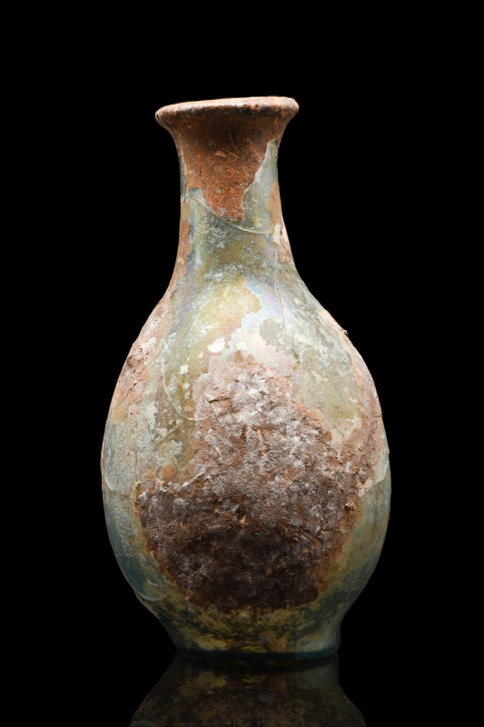 ANCIENT ROMAN GLASS FLASK
Ca. 100-300 AD. 
A beautiful glass flask with a bulb...