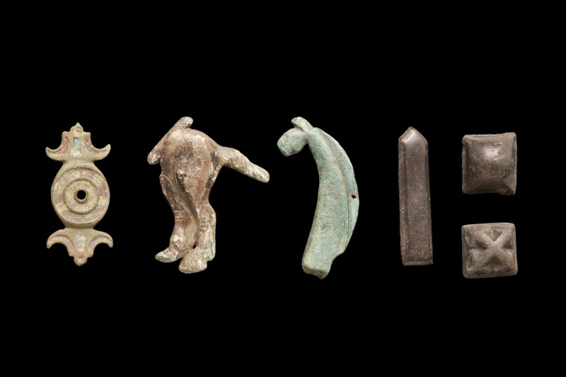 COLLECTION OF ROMAN ARTIFACTS
Ca. 100-300 AD. 
A group of Roman bronze artifac...