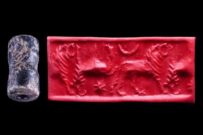 UR III BLACK STONE CYLINDER SEAL
Ca. 2100-2000 BC. 
A nicely carved Ur III bla...