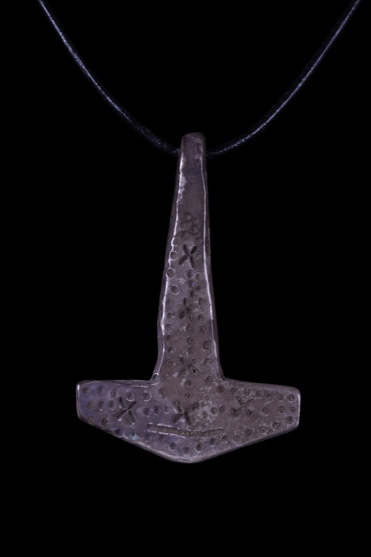 VIKING SILVER THOR'S HAMMER
Ca. 900-1100 AD. 
A stunning silver pendant in the...