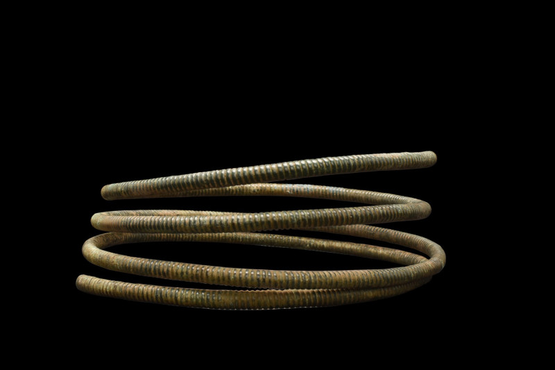 MASSIVE VIKING TWISTED NECK TORC
Ca. 900-1100 AD. 
A beautiful bronze torc of ...