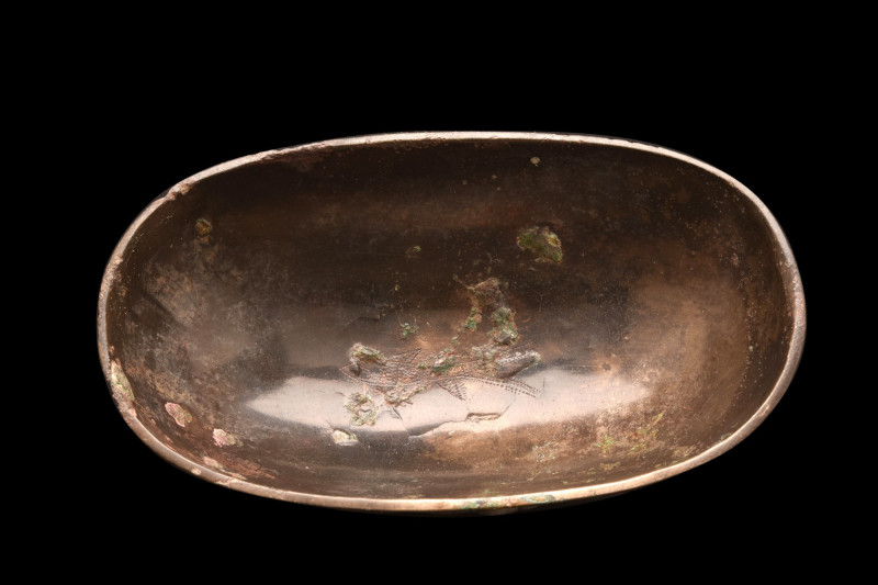 SASSANIAN BRONZE BOAT-SHAPED BOWL
Ca. 224-651 AD. 
A bronze boat-shaped bowl w...