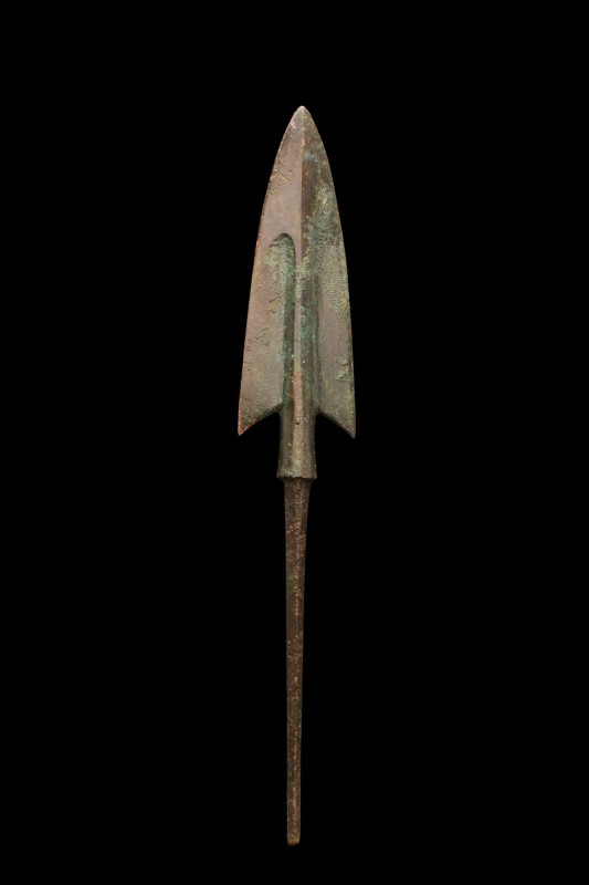 ANCIENT BRONZE SPEARHEAD
Western Asiatic/Aegean, Ca. 1200-700 BC. 
A bronze sp...