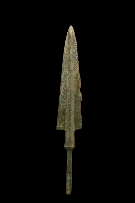 ANCIENT BRONZE SPEARHEAD
Western Asiatic/Aegean, Ca. 1200-700 BC. 
A bronze sp...