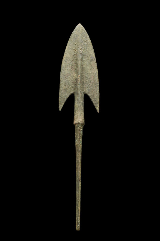 ANCIENT BRONZE SPEARHEAD
Western Asiatic/Aegean, Ca. 1200-700 BC. 
A bronze sp...