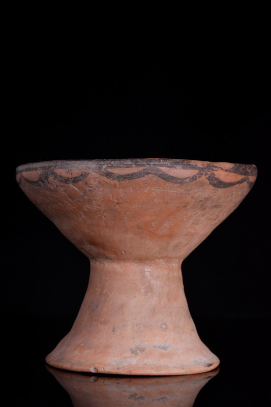 NEOLITHIC POTTERY STEM BOWL
Machang Phase, Ca. 2300-2000 BC. 
A stem bowl with...