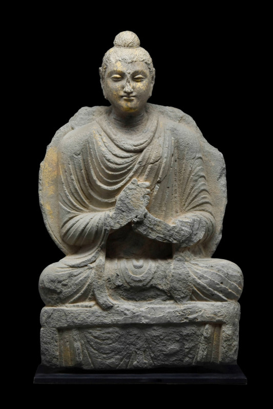 GANDHARA SCHIST SEATED BUDDHA FIGURE
Ca. 300-400 AD. 
A seated schist figure o...