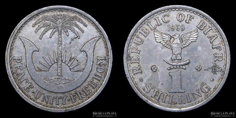 Biafra. 1 Shilling 1969. Aluminio; 23.5mm; 1.78g. KM2 (VF)
Estimate: USD 50-100