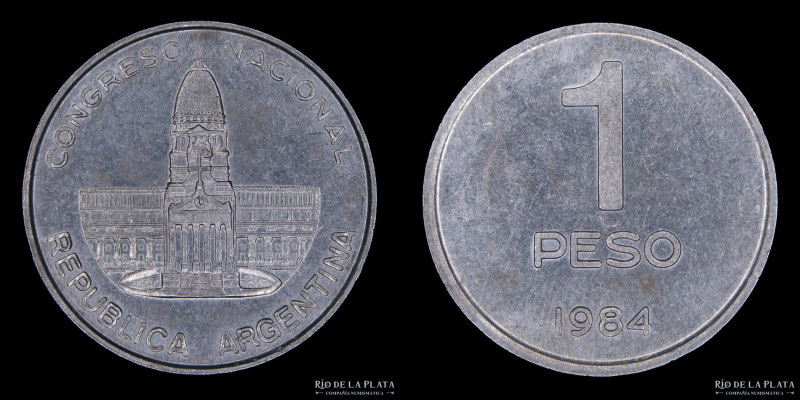 Argentina. Variante. 1 Peso 1989. Con reloj en frontispicio. AL; 23mm; 2.2g. CJ ...