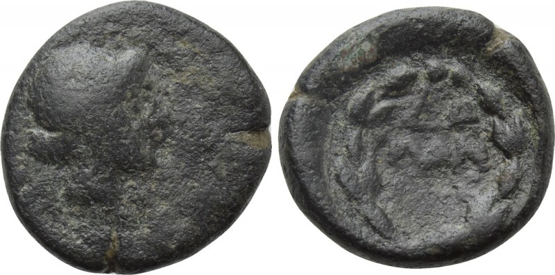 UNCERTAIN. Ae (Circa 2nd-1st centuries BC). 

Obv: Head (of Apollo?) right.
R...