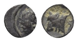 Caria, Uncertain, c. 400 BC. AR Hemiobol (5.8mm, 0.2 g). Facing lion’s head, turned slightly l. R/ Bull’s head l.