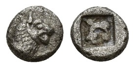 Caria, Mylasa(?). Ca. 520-490 B.C. AR 1/24 stater (6.5mm, 0.4 g). Forepart of lion right / Incuse square punch.