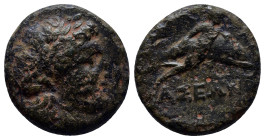 CARIA. Iasos. Ae (18mm, 6.3 g) (Circa 250-190 BC). Obv: Laureate head of Apollo right. Rev: ΙΑΣΕΩΝ. Hermias swimming with dolphin right.