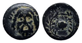 AEOLIS. Autokane. Ae (12mm, 1.8 g)(4th century BC). Obv: Head of Zeus facing slightly right. Rev: Barley grain within wreath.