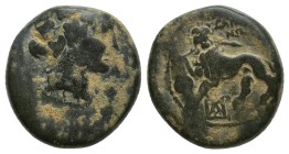 LYDIA. Sardeis. Ae (16mm, 6.1 g) (2nd-1st centuries BC). Obv: Wreathed head of Dionysos right. Rev: ΣΑΡΔΙΑΝΩΝ. Horned lion standing left, breaking spe...