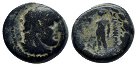 Lydia. Sardeis circa 200-133 BC. Bronze Æ (15mm, 5.5 g). Unbearded, laureate head of Herakles right, lionskin knotted around neck / ΣAΡΔIANΩN, Apollo,...