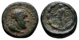 Lydia. Sardeis circa 200-133 BC. Bronze Æ (14mm, 3.8 g). Unbearded, laureate head of Herakles right, lionskin knotted around neck / ΣAΡΔIANΩN, Apollo,...