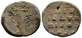 BYZANTINE LEAD SEALS. (24mm, 13.9 g). Obv: Cruciform monogram. Rev: Legend four lines.