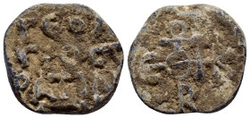 BYZANTINE LEAD SEALS. (22mm, 9.5 g). Obv: Legend three lines. Rev: Cruciform monogram.