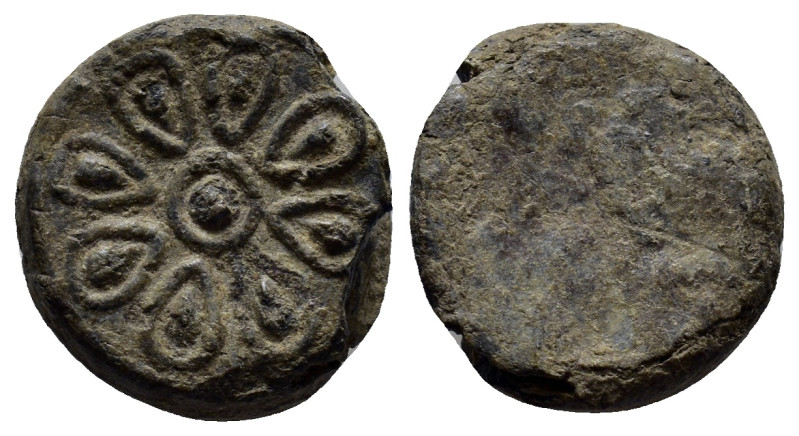 Lead seal, eight pointed star. 17mm, 4.6 gr.