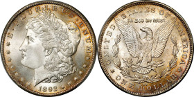 1892-CC Morgan Silver Dollar. MS-66 (PCGS).
Beautifully toned around the peripheries, both sides of this silver dollar are framed in halos of iridesc...