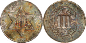 1859 Silver Three-Cent Piece. MS-66 (PCGS).
Really a lovely example, the surfaces are dressed in vivid iridescent toning of antique gold, steel-olive...