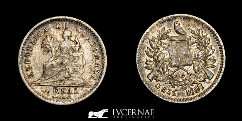 Republic of Guatemala - 1/2 real silver .835, minted in the year 1896.

Good ver...