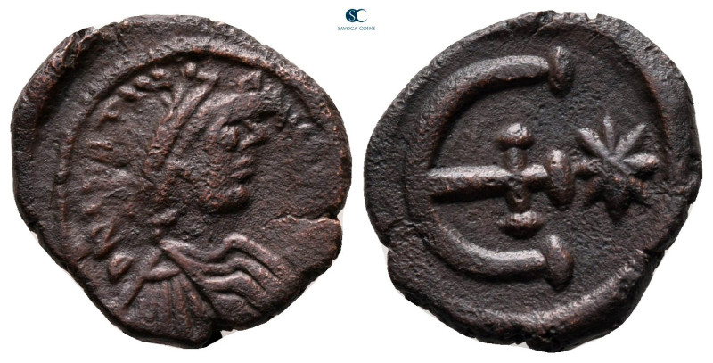 Justinian I AD 527-565. Antioch
Pentanummium Æ

17 mm, 2,54 g



very fin...