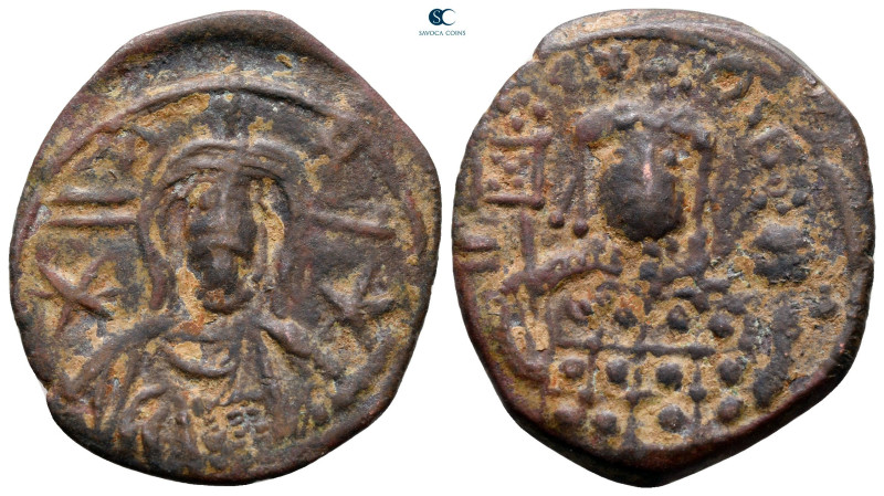 Michael VII Ducas AD 1071-1078. Contemporary Barbaric imitation
Follis Æ

28 ...