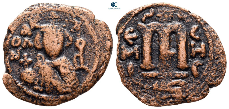 Arab-Byzantine . Abd al-Malik ibn Marwan AH 685-708. 
follis Ae

24 mm, 3,48 ...