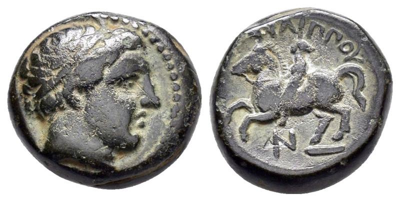 KINGS of MACEDON. Philipp II (359-336). Ae.

Obv : Diademed head of Apollo right...