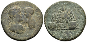 CAPPADOCIA. Caesarea. Macrinus with Diadumenian.(217-218). Ae. 

Obv : AY K M OΠ CЄOY MAKPINOC M OΠ ΔIAΔOY ANTωNЄI.
Draped busts of Macrinus, laureate...