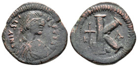 JUSTIN I (518-527). Half Follis. Cyzicus.

Obv: D N IVSTINVS P P AVG.
Diademed, draped and cuirassed bust right.

Rev: Large K; to left, cross between...