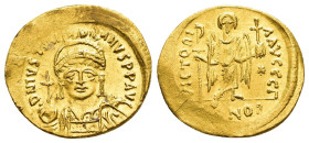 JUSTINIAN I.(527-565).Constantinople.Solidus.

Obv : D N IVSTINIANVS P P AVG.
Helmeted and cuirassed bust facing, holding globus cruciger and shield d...