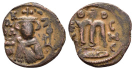ISLAMIC. Arab-Byzantine.(Circa 685-692).Hims.Fals.

Obv : Crowned and draped imperial bust facing, holding globus cruciger.

Rev : Large M.
Album 3524...