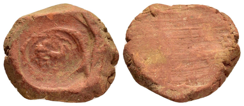 ANCIENT ROMAN TERRACOTTA SEAL / BULLA.(1st-2nd Century).

Weight : 2.3 gr
Diamet...