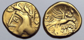Northwest Gaul, the Carnutes AV Hemistater. Circa 50-30 BC. Head to left / Eagle flying to right, wings spread, holding beaded wheel; crescent and bes...