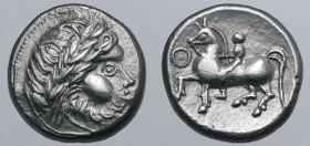 Celts in Eastern Europe AR Tetradrachm. Kegelreiter Type. Transylvania, circa 2nd century BC. Celticised, laureate and bearded head of Zeus to right /...